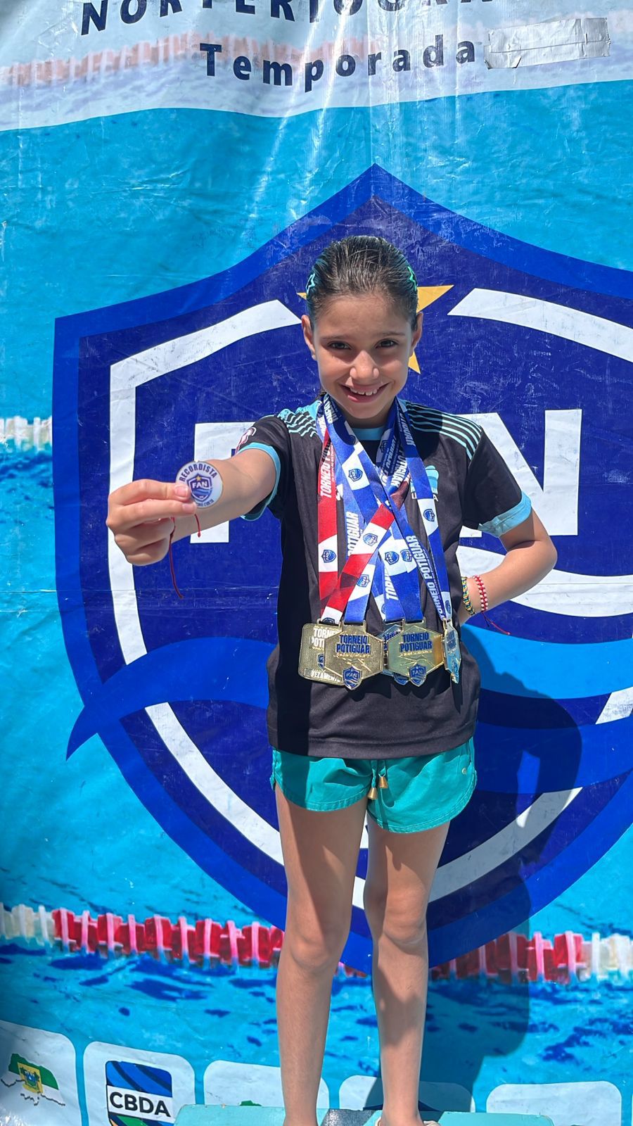 Areia-branquense Lívia Ester conquista títulos e bate recorde no Troféu Potiguar de Piscina Curta